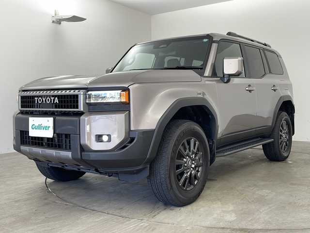 トヨタ ランドクルーザー ２５０ VX 兵庫県 2024(令6)年 1.4万km アバンギャルドブロンズメタリック ・純正12.3インチディスプレイオーディオ（USB/BT/TV/Miracast/HDMI)/・サンルーフ/・デジタルインナーミラー/・パノラミックビューモニター/・プリクラッシュセーフティ/・レーダークルーズコントロール/・オートマチックハイビーム/・クリアランスソナー/・ブラインドスポットモニター/・レザーシート/・パワーシート/・シートヒーター/・シートベンチレーション/・パワーバックドア/・プロアクティブドライビングアシスト/・ロードサインアシスト/・リヤカメラディテクション/・リヤクロストラフィックアラート/・後方車両接近告知/・安心降車サポート/・デフロックスイッチ/・ECT2nd/・ビルトインＥＴＣ2.0/・前後ドライブレコーダー/・ＬＥＤヘッドライト/・電動パーキングブレーキ/・オートブレーキホールド/・スペアキー/・プッシュスタート