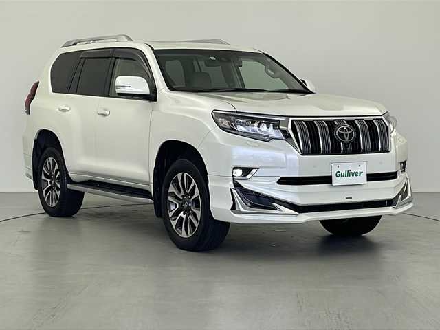 トヨタ ランドクルーザー プラド TX Lパッケージ 岐阜県 2022(令4)年 3.8万km ホワイトパールクリスタルシャイン トヨタ純正ディスプレイオーディオ/Bluetooth接続/フルセグTV/全周囲カメラ/サンルーフ/ドライブレコーダー/モデリスタエアロ/トヨタセーフティーセンス/プリクラッシュセーフティ/レーンディパーチャーアラート/オートマチックハイビーム/ブラインドスポットモニター/レーダークルーズコントロール/フォグランプ/純正ドアバイザー/純正フロアマット/純正アルミホイール/パワーシート/レザーシート/シートヒーター/シートクーラー/LEDヘッドライト/ETC2.0