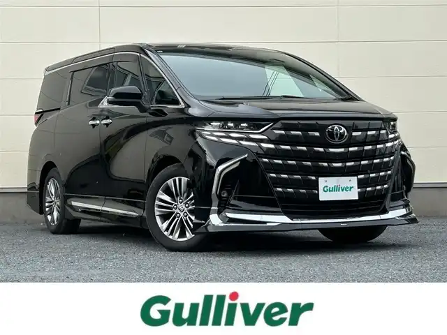 トヨタ アルファード Z 茨城県 2024(令6)年 1.1万km ブラック フルモデリスタエアロ/メーカーOPナビ/(AM/FM/BT/フルセグ)/全方位カメラ/サンルーフ/デジタルインナーミラー/ビルドインETC2.0/三眼ヘッドライト/両側パワースライドドア/レーダークルーズコントロール/クリアランスソナー/パワーシート/シートヒーター/エアシート/オットマン/3列シート/純正フロアマット/純正ドアバイザー/純正18インチアルミホイール