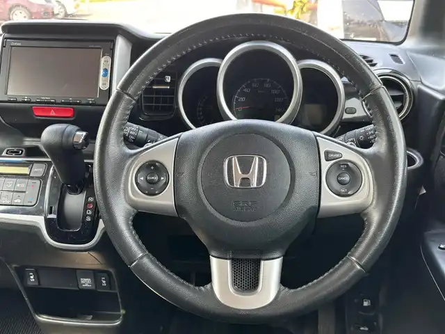 ホンダ Ｎ ＢＯＸ カスタム G ターボSSパッケージ 宮城県 2015(平27)年 8.6万km カトラリーシルバーM シティブレーキアクティブシステム/4WD/純正SDナビ/【CD・DVD・SD・ワンセグTV】/バックカメラ/両側パワースライドドア/クルーズコントロール/パドルシフト/前席シートヒーター/ステアリングスイッチ/横滑り防止装置/社外アルミ/オートライト/HIDヘッドライト/フォグライト/スマートキーX２/ETC