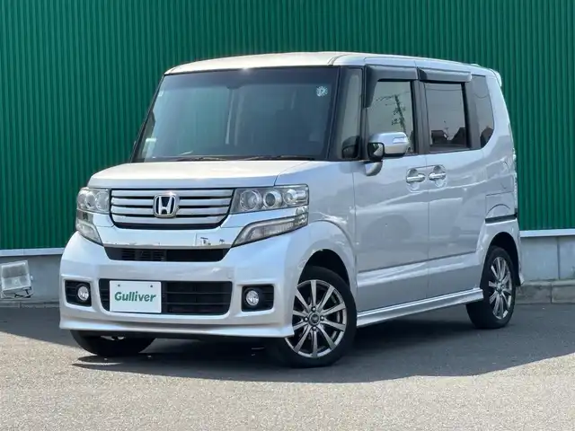 ホンダ Ｎ ＢＯＸ カスタム G ターボSSパッケージ 宮城県 2015(平27)年 8.6万km カトラリーシルバーM シティブレーキアクティブシステム/4WD/純正SDナビ/【CD・DVD・SD・ワンセグTV】/バックカメラ/両側パワースライドドア/クルーズコントロール/パドルシフト/前席シートヒーター/ステアリングスイッチ/横滑り防止装置/社外アルミ/オートライト/HIDヘッドライト/フォグライト/スマートキーX２/ETC