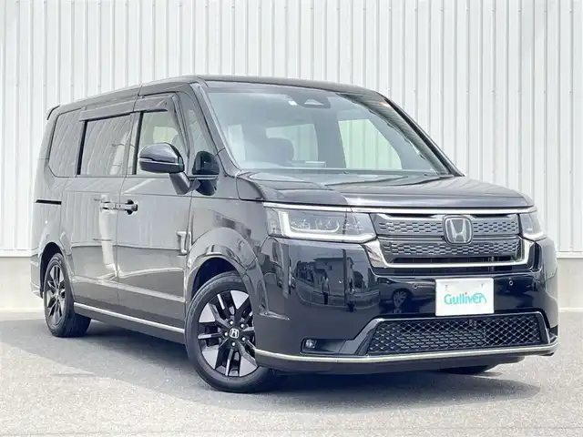 ホンダ ステップワゴン スパーダ 群馬県 2023(令5)年 3.2万km クリスタルブラックパール ワンオーナー/HondaSENSING/・衝突軽減ブレーキ/・先行車発信お知らせ機能/・路外逸脱抑制機能/・車線維持支援機能/・標識認識支援機能/・アダプティブクルーズコントロール/・ブラインドスポットインフォメーション/11.4インチホンダコネクトナビ/（CD/DVD/ipod/Bluetooth/フルセグ）/15.6インチフリップダウンモニター/ＡｎｄｒｏｉｄＡｕｔｏ対応/ＡｐｐｌｅＣａｒＰｌａｙ対応/バックカメラ/両側パワースライドドア/パワーバックドア/ハーフレザーシート/プッシュスタート/アイドリングストップ/前席シートヒーター/ダブルエアコン/オートライト/ETC/ステアリングスイッチ/ドアバイザー/純正フロアマット/純正16インチAW/F/Rコーナーセンサー/スペアキー×1/保証書/取扱説明書