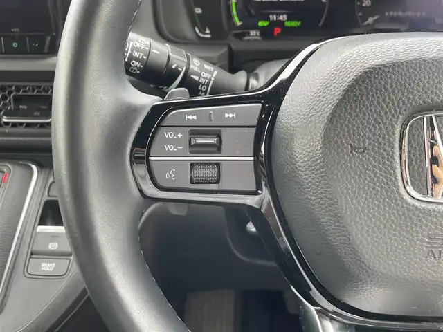 ホンダ ステップワゴン スパーダ eHEV 群馬県 2023(令5)年 2.4万km プラチナホワイトパール HondaSENSING/・衝突軽減ブレーキ/・先行車発信お知らせ機能/・路外逸脱抑制機能/・車線維持支援機能/・標識認識支援機能/・アダプティブクルーズコントロール/・ブラインドスポットインフォメーション/純正9インチナビ/（CD/DVD/ipod/Bluetooth/フルセグ）/10.1インチフリップダウンモニター/ＡｎｄｒｏｉｄＡｕｔｏ対応/ＡｐｐｌｅＣａｒＰｌａｙ対応/バックカメラ/両側パワースライドドア/パワーバックドア/ハーフレザーシート/プッシュスタート/アイドリングストップ/前席シートヒーター/ダブルエアコン/オートライト/ETC/前方ドライブレコーダー/ステアリングスイッチ/ドアバイザー/純正フロアマット/純正16インチAW/F/Rコーナーセンサー/保証書/取扱説明書/スペアキー×1