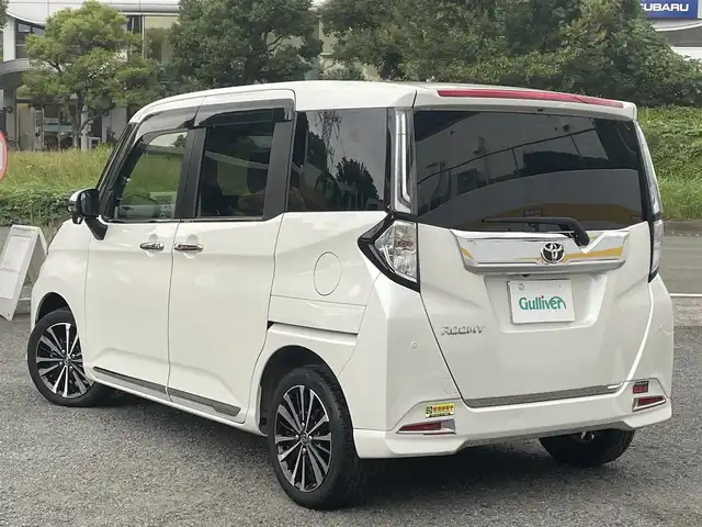 トヨタ ルーミー カスタムG－T 神奈川県 2022(令4)年 2.5万km パールホワイトⅢ ワンオーナー/社外９インチSDナビ・フルセグ・DVD・CD・SD・MSV・USB・Bluetoorh/アラウンドビューカメラ/ビルトインETC/革巻きステアリング/ステアリングリモコン/クルーズコントロール/社外ミラー型ドライブレコーダー/オートホールドメモリー機能/スマートアシスト/前席シートヒーター/シートバックテーブル（運転席・助手席背面）/純正１５インチアルミ/フロアマット/ドアバイザー/新車時保証書/取扱説明書/スマートキー×2