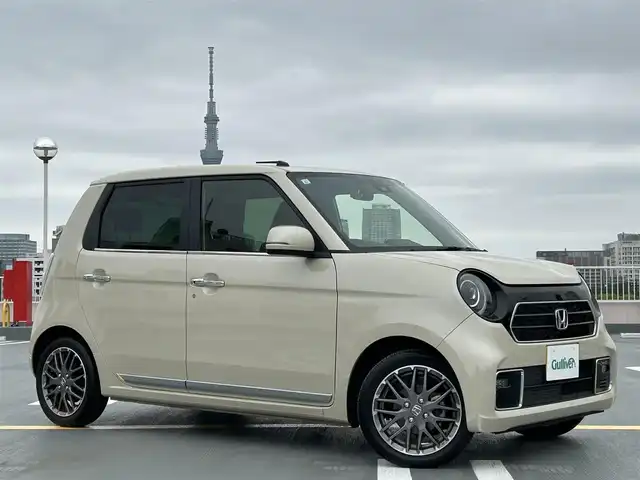 ホンダ Ｎ ＯＮＥ プレミアム ツアラー 東京都 2021(令3)年 2.9万km プレミアムアイボリーパールⅡ ワンオーナー/Gathers製ナビ（VXM-215Ci)/バックカメラ/ハーフレザーシート/シートヒーター/ETC/純正１５インチアルミ/社外ドライブレコーダー（3.0ultra wide L CD)/ホンダセンシング/衝突軽減ブレーキ（CMBS)/誤発進抑制/後方誤発進抑制/歩行者事故低減ステアリング/路外逸脱抑制/先行車発進お知らせ/オートハイビーム/アダプティブクルーズコントロール/エンジンプッシュボタン/スマートキー/スペアキー１本/保証書・取説