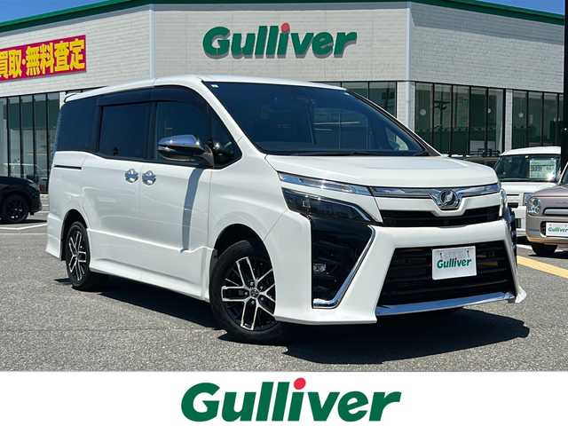 トヨタ ヴォクシー ZS 煌Ⅱ 鳥取県 2019(平31)年 4.4万km ホワイトパールクリスタルシャイン 社外10型ナビ/フルセグ/DVD/CD/BT/バックカメラ/ETC/前後ドライブレコーダー/トヨタセーフティセンス/クルーズコントロール/レーンキープアシスト/オートマチックハイビーム/両側パワースライドドア/LEDヘットライト/社外16インチアルミホイール/プッシュエンジンスタート/アイドリングストップ/スマートキー×2