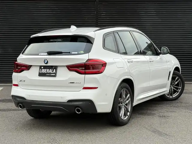 ＢＭＷ ＢＭＷ Ｘ３ xDrive20d Mスポーツ 静岡県 2020(令2)年 3.5万km アルピンホワイトⅢ セレクトパッケージ/・電動パノラマガラスサンルーフ/・リヤサイドウインドーローラーブラインド/・harman/kardonサラウンドサウンドシステム/BMWヘッドアップディスプレイ/BSM/ハーフレザーシート/電動リアゲート/iDrive/(BT/ScreenMirroring/フルセグ)/ドライビングアシストプラス/・ACC/・ステアリング&レーンコントロールアシスト/・レーンディパーチャーウォーニング/・レーンチェンジウォーニング/・アクティブサイドコリジョンプロテクション/・前車接近警告機能/・衝突回避・被害軽減ブレーキ/・事故回避アシスト/・後車衝突警告機能/・クロストラフィックウォーニング/パーキングアシストプラス/・PDC/・パーキングアシスト/・トップビュー/・サイドビュー・カメラ/・リヤビューカメラ/インテリジェントセーフティ/メモリー付パワーシート/シートヒーター/ETC/ドライブレコーダー/保証書/取説/スペアキー