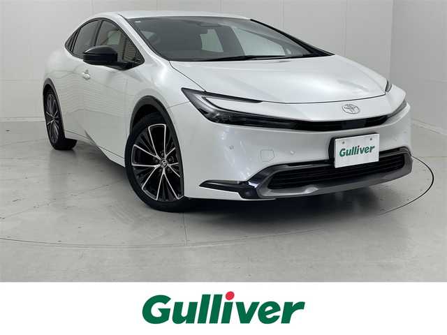 トヨタ プリウス Z 茨城県 2024(令6)年 0.8万km プラチナホワイトパールマイカ 純正12.3型DA（コネクティッドナビ対応）Plus/全周囲カメラ/フルセグ/デジタルインナーミラー/アドバンストパーク/衝突被害軽減ブレーキ/車線逸脱抑制装置/レーダークルーズコントロール/オートマチックハイビーム/クリアランスソナー/BSM/ETC2.0/ドラレコ/AC100V/シートヒーター/ベンチレーション/ステアリングヒーター/純正19インチAW/LEDヘッドライト/スマートキー