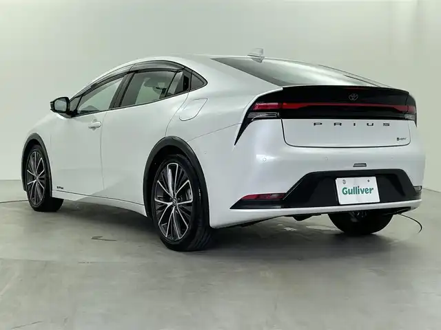 トヨタ プリウス Z 福井県 2023(令5)年 1.9万km プラチナホワイトパールマイカ 純正ナビ/Toyota Safety Sense/・プリクラッシュセーフティ/・レーンディパーチャーアラート/・レーダークルーズコントロール/ワイヤレス充電/パワーバックドア/電動パーキングブレーキ/ETC2.0/エアシート/シートヒーター/ステアリングヒーター/運転席パワーシート