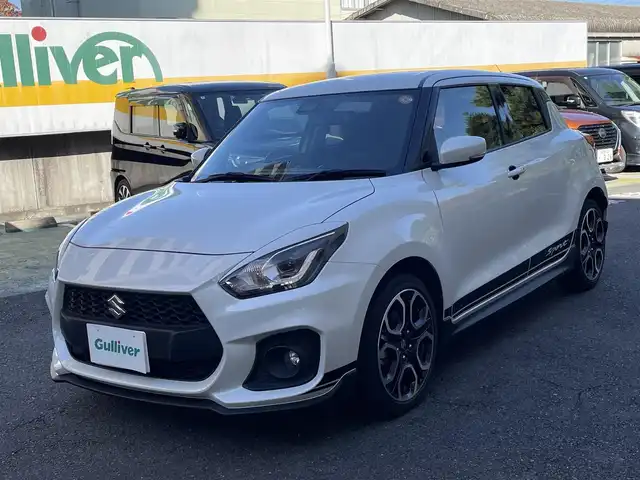 スズキ スイフト スポーツ 静岡県 2024(令6)年 0.7万km ピュアホワイトP ワンオーナー/社外デジタルインナーミラー型/　　前後ドライブレコーダー/ビルトインETC/運転席シートヒーター/衝突軽減ブレーキ/レーンキープアシスト/バックソナー/ブラインドスポットモニター/レーダークルーズコントロール/ドアハンドルプロテクター/バックフォグ/LEDヘッドライト/純正17インチAW/スマートキー×2/保証書/取扱説明書