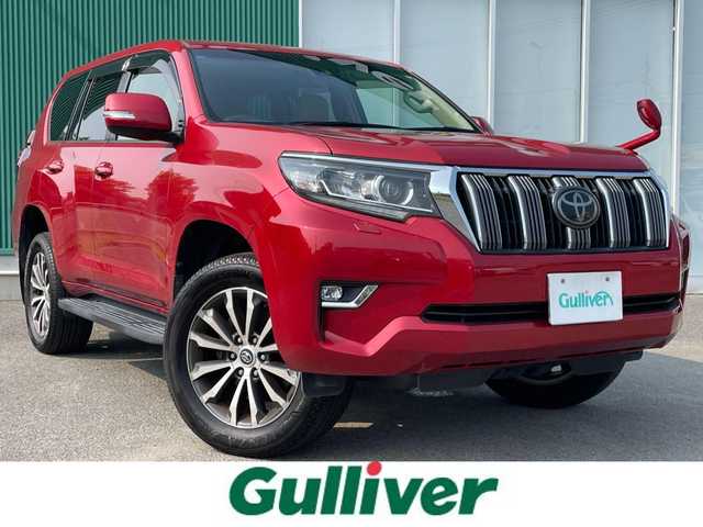 トヨタ ランドクルーザー プラド TX Lパッケージ 福岡県 2018(平30)年 9.2万km レッドマイカメタリック トヨタセーフティセンス/横滑り防止/盗難防止/コーナーセンサー/ドラレコ/パーキングアシスト/バックカメラ/エアバッグ/カーテンエアバッグ/SDナビ/BT/フルセグTV/SDサーバー/純正アルミホイール/純正フロアマット/プッシュスタート/スマートキー/オートライト/オートハイビーム/４WD/LEDヘッド/サンルーフ/電動格納サードシート/エアシート/シートヒーター