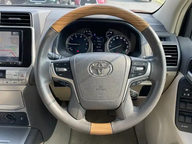 トヨタ ランドクルーザー プラド TX Lパッケージ 福岡県 2018(平30)年 9.2万km レッドマイカメタリック トヨタセーフティセンス/横滑り防止/盗難防止/コーナーセンサー/ドラレコ/パーキングアシスト/バックカメラ/エアバッグ/カーテンエアバッグ/SDナビ/BT/フルセグTV/SDサーバー/純正アルミホイール/純正フロアマット/プッシュスタート/スマートキー/オートライト/オートハイビーム/４WD/LEDヘッド/サンルーフ/電動格納サードシート/エアシート/シートヒーター