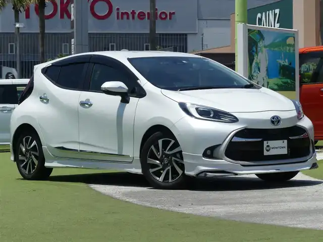 トヨタ アクア Z 千葉県 2022(令4)年 1.8万km プラチナホワイトパールマイカ 外部検査実施済み/ワンオーナー/モデリスタエアロ(前、横、後下、後)/Apple car play/純正メモリナビ/(フルセグTV/Bluetooth/USB)/パノラミックビューモニター/ハーフレザーシート/D席パワーシート/前席シートヒーター/ブラインドスポットモニター/ヘッドアップディスプレイ/セーフティセンス/・プリクラッシュセーフティ/・レーントレーシングアシスト/・レーダークルーズコントロール/・オートマチックハイビーム/・ロードサインアシスト/LEDヘッドライト/スマートキー/ビルトインETC2.0/前後ドライブレコーダー/ステアリングヒーター/100V電源/横滑り防止機能/純正16インチアルミホイール/カーテンエアバック/保証書/取扱説明書/スペアキー