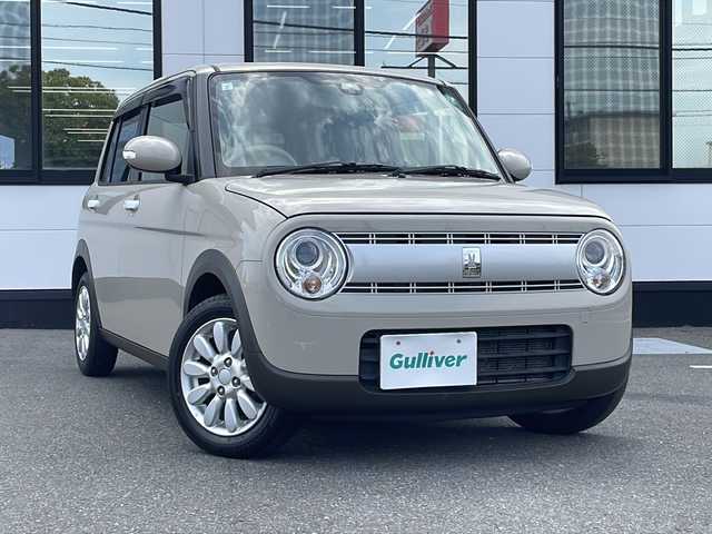 スズキ ラパン X 山口県 2019(平31)年 5.7万km フォーンベージュM 社外SDナビ【CN-RX05D】/・ワンセグテレビ/・Bluetooth/・CD/DVD/Blu-ray/・SD/・iPod/シートヒーター（運転席側）/プッシュスタート/スマートキー/純正フロアマット/安全装備/・デュアルカメラブレーキサポート	 	 	 /・誤発進抑制機能	 	 	 /・後退時ブレーキサポート	 	 	 /・後方誤発進抑制機能	 	 	 /・リヤパーキングセンサー	 	 	 /・車線逸脱警報機能	 	 	 /・ふらつき警報機能	 	 	 /・先行車発進お知らせ機能	 	 	 /・ハイビームアシスト	 	 	 /・標識認識機能	 	 	 /・エマージェンシーストップシグナル	 	 	 /・ヒルホールドコントロール	 	 	 /・LEDヘッドランプ/ウィンカー付電動格納ミラー/ドアバイザー/純正アルミホイール