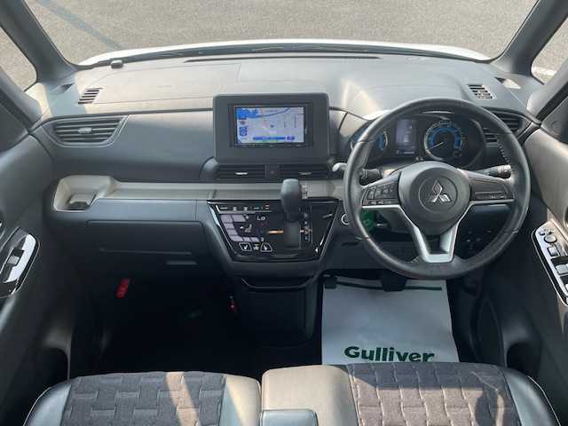 三菱 デリカミニ G 長崎県 2023(令5)年 4.3万km アメジストブラック/シルキーホワイト 社外ナビ/Bluetooth/バックカメラ/左側パワースライドドア/ハーフレザー調シート/前席シートヒーター/ステアリングスイッチ/オートライト/LEDヘッドライト/コーナーセンサー/ETC