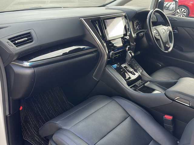 トヨタ アルファードハイブリット SR Cパッケージ 青森県 2021(令3)年 6.9万km ホワイトパールクリスタルシャイン 4WD/純正9インチDAナビ・フルセグTV/純正12.1インチフリップダウンモニター/CD・DVD・Bluetooth・ミラキャスト/黒革シート/前席エアシート・ヒーター/ステアリングヒーター/両側パワースライドドア/パワーバックドア/セーフティセンス/プリクラッシュセーフティ/レーダークルーズコントロール/レーントレーシングアシスト/アダプティブハイビームシステム/パーキングサポートブレーキ/AC100V1500W/ビルトインETC/3眼LEDヘッドランプ/LEDフォグランプ/社外車高調（純正有）/社外20インチアルミ/モデリスタエアロ/スペアキー/保証書・取説書