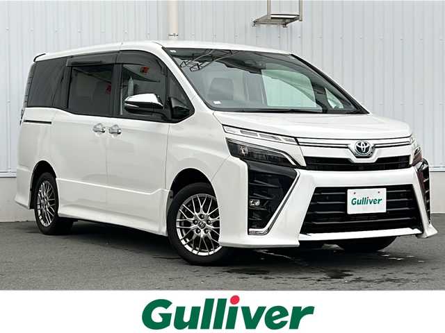 トヨタ ヴォクシー ハイブリッド ZS 煌Ⅲ 三重県 2021(令3)年 4.1万km ホワイトパールクリスタルシャイン 純正9型ナビ /バックカメラ /両側パワースライドドア/ビルトインETC /前席シートヒーター /前後コーナーセンサー /前後ドライブレコーダー/USB給電 /LEDヘッドライト/オートハイビーム /オートライト/トヨタセーフティセンス /クルーズコントロール /レーンキープアシスト/衝突軽減ブレーキ/純正フロアマット/ハーフレザーシート/電動格納ミラー/禁煙車