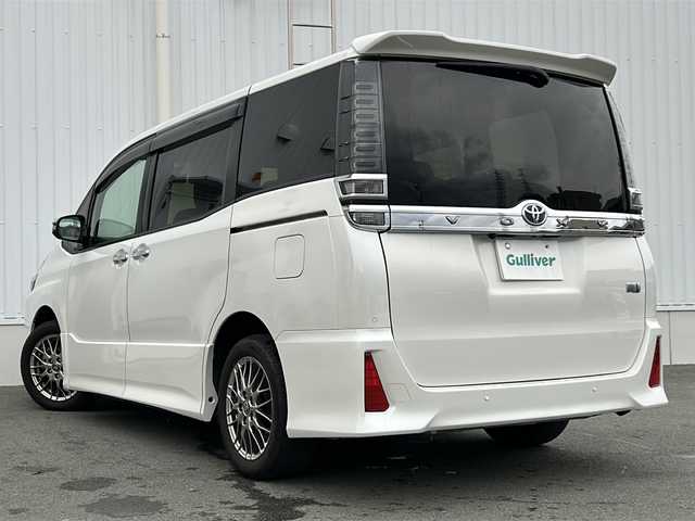 トヨタ ヴォクシー ハイブリッド ZS 煌Ⅲ 三重県 2021(令3)年 4.1万km ホワイトパールクリスタルシャイン 純正9型ナビ /バックカメラ /両側パワースライドドア/ビルトインETC /前席シートヒーター /前後コーナーセンサー /前後ドライブレコーダー/USB給電 /LEDヘッドライト/オートハイビーム /オートライト/トヨタセーフティセンス /クルーズコントロール /レーンキープアシスト/衝突軽減ブレーキ/純正フロアマット/ハーフレザーシート/電動格納ミラー/禁煙車