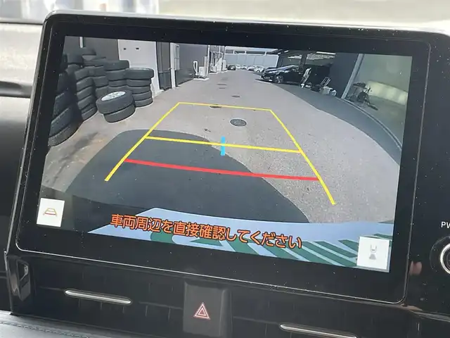 トヨタ ヴォクシー ハイブリッド S－Z 滋賀県 2023(令5)年 2.7万km アティチュードブラックマイカ 禁煙車/10.5インチディスプレイオーディオ/純正フリップダウンモニター/デジタルミラー/前後ドライブレコーダー/ETC2.0/両側パワースライドドア/トヨタセーフティセンス/・プリクラッシュセーフティ/・レーンディパーチャーアラート/・オートマチックハイビーム/・ドライバー異常時対応システム/・発進遅れ告知機能/・レーントレーシングアシスト/・レーダークルーズコントロール/・ロードサインアシスト/・プロアクティブドライビングアシスト/スマートキー/LEDライト/シートヒーター
