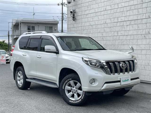 トヨタ ランドクルーザー プラド TX 埼玉県 2016(平28)年 8.7万km ホワイトパールクリスタルシャイン ワンオーナー/外部検査済み/ディーゼルターボ／4WD/中期型/OPルーフレール/OPナビゲーション/（CD/DVD/フルセグTV/Bluetooth）/バックカメラ/センターデフロック/ダウンヒルアシスト/ウッドコンビステアリング/サイドステップ/サイドエアバッグ/カーテンエアバッグ/スリップコントロール/LEDヘッドライト/FRコーナーセンサー/純正17インチアルミ/フロアマット/ドアバイザー/スマートキー/スペアキー/新車保証書／取扱説明書