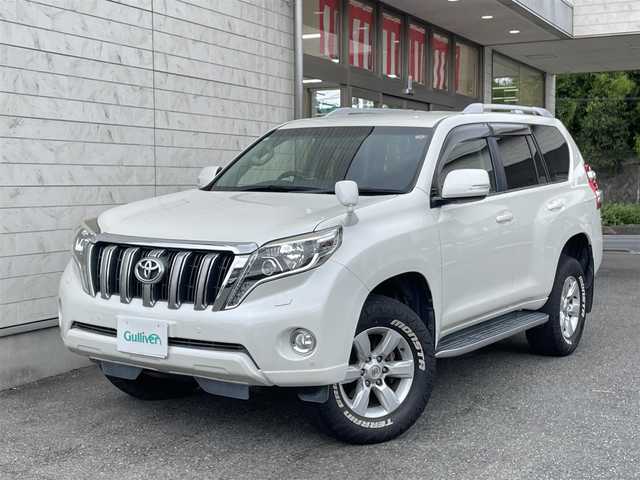 トヨタ ランドクルーザー プラド TX 埼玉県 2016(平28)年 8.7万km ホワイトパールクリスタルシャイン ワンオーナー/外部検査済み/ディーゼルターボ／4WD/中期型/OPルーフレール/OPナビゲーション/（CD/DVD/フルセグTV/Bluetooth）/バックカメラ/センターデフロック/ダウンヒルアシスト/ウッドコンビステアリング/サイドステップ/サイドエアバッグ/カーテンエアバッグ/スリップコントロール/LEDヘッドライト/FRコーナーセンサー/純正17インチアルミ/フロアマット/ドアバイザー/スマートキー/スペアキー/新車保証書／取扱説明書