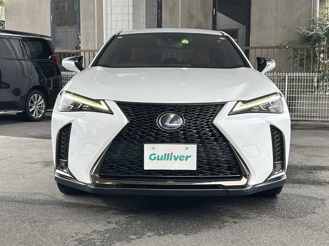 レクサス ＵＸ 250h Fスポーツ 京都府 2019(平31)年 9.4万km ホワイトノーヴァガラスフレーク １２．３インチ純正メモリーナビ　/フルセグTV/CD再生機能/Bluetooth/サンルーフ　/3眼LEDヘッドライト /オートライト/オートマチックハイビーム/電動格納ウィンカーミラー/バックカメラ　/電動パーキングブレーキ/ステアリングスイッチ/ステアリングヒーター　/禁煙　/クリアランスソナー /メモリーパワーシート /パドルシフト /シートヒーター /前方純正ドライブレコーダー(DRT-H68A)/電動リアゲート/レーダークルーズコントロール/レーンキープアシスト/盗難防止装置/Wサイドエアバッグ