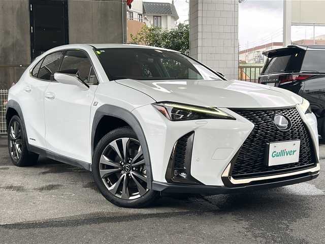 レクサス ＵＸ 250h Fスポーツ 京都府 2019(平31)年 9.4万km ホワイトノーヴァガラスフレーク １２．３インチ純正メモリーナビ　/フルセグTV/CD再生機能/Bluetooth/サンルーフ　/3眼LEDヘッドライト /オートライト/オートマチックハイビーム/電動格納ウィンカーミラー/バックカメラ　/電動パーキングブレーキ/ステアリングスイッチ/ステアリングヒーター　/禁煙　/クリアランスソナー /メモリーパワーシート /パドルシフト /シートヒーター /前方純正ドライブレコーダー(DRT-H68A)/電動リアゲート/レーダークルーズコントロール/レーンキープアシスト/盗難防止装置/Wサイドエアバッグ