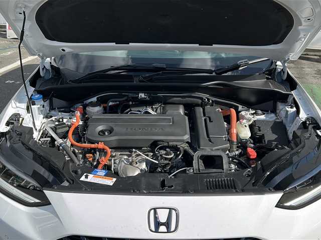 ホンダ ＺＲ－Ｖ ハイブリッド e:HEV Z 愛知県 2023(令5)年 3.6万km プラチナホワイトパール ・禁煙車/・純正９インチナビ/・フルセグTV/・BOSEプレミアムサウンド/・マルチヴューカメラ/・黒本革シート/・ホンダセンシング/・前席パワーシート/・前席シートヒーター/・前後ドライブレコーダー/・ビルトインETC2.0/・ワイヤレス充電/・アダプティブドライビングビーム/・ステアリングヒーター/・ハンズフリーパワーテールゲート/・パドルシフト/・ドライブモードスイッチ/・純正１８インチアルミ/・パーキングセンサー/・電子パーキング/・電動格納ミラーウインカー/・純正フロアマット/・取扱説明書