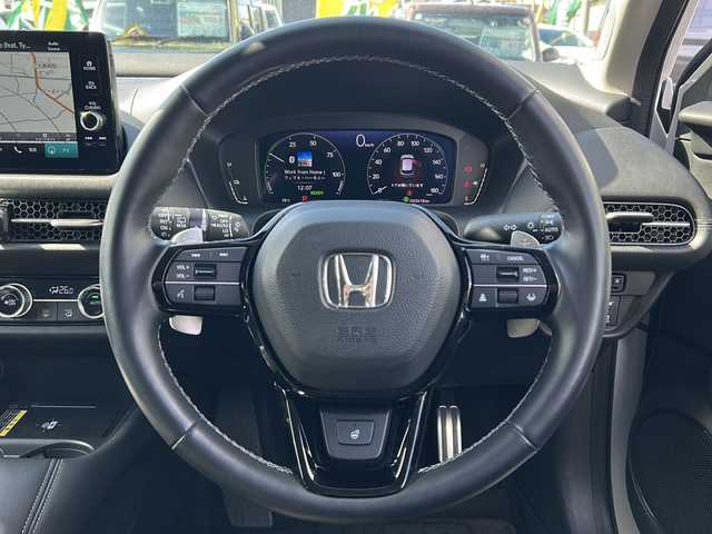 ホンダ ＺＲ－Ｖ ハイブリッド e:HEV Z 愛知県 2023(令5)年 3.6万km プラチナホワイトパール ・禁煙車/・純正９インチナビ/・フルセグTV/・BOSEプレミアムサウンド/・マルチヴューカメラ/・黒本革シート/・ホンダセンシング/・前席パワーシート/・前席シートヒーター/・前後ドライブレコーダー/・ビルトインETC2.0/・ワイヤレス充電/・アダプティブドライビングビーム/・ステアリングヒーター/・ハンズフリーパワーテールゲート/・パドルシフト/・ドライブモードスイッチ/・純正１８インチアルミ/・パーキングセンサー/・電子パーキング/・電動格納ミラーウインカー/・純正フロアマット/・取扱説明書