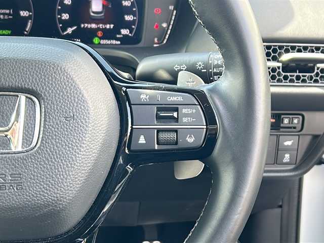 ホンダ ＺＲ－Ｖ ハイブリッド e:HEV Z 愛知県 2023(令5)年 3.6万km プラチナホワイトパール ・禁煙車/・純正９インチナビ/・フルセグTV/・BOSEプレミアムサウンド/・マルチヴューカメラ/・黒本革シート/・ホンダセンシング/・前席パワーシート/・前席シートヒーター/・前後ドライブレコーダー/・ビルトインETC2.0/・ワイヤレス充電/・アダプティブドライビングビーム/・ステアリングヒーター/・ハンズフリーパワーテールゲート/・パドルシフト/・ドライブモードスイッチ/・純正１８インチアルミ/・パーキングセンサー/・電子パーキング/・電動格納ミラーウインカー/・純正フロアマット/・取扱説明書