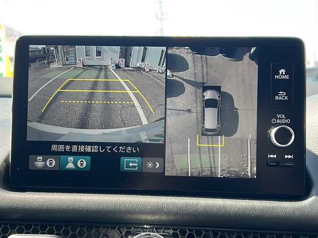 ホンダ ＺＲ－Ｖ ハイブリッド e:HEV Z 愛知県 2023(令5)年 3.6万km プラチナホワイトパール ・禁煙車/・純正９インチナビ/・フルセグTV/・BOSEプレミアムサウンド/・マルチヴューカメラ/・黒本革シート/・ホンダセンシング/・前席パワーシート/・前席シートヒーター/・前後ドライブレコーダー/・ビルトインETC2.0/・ワイヤレス充電/・アダプティブドライビングビーム/・ステアリングヒーター/・ハンズフリーパワーテールゲート/・パドルシフト/・ドライブモードスイッチ/・純正１８インチアルミ/・パーキングセンサー/・電子パーキング/・電動格納ミラーウインカー/・純正フロアマット/・取扱説明書