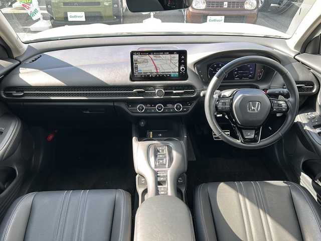 ホンダ ＺＲ－Ｖ ハイブリッド e:HEV Z 愛知県 2023(令5)年 3.6万km プラチナホワイトパール ・禁煙車/・純正９インチナビ/・フルセグTV/・BOSEプレミアムサウンド/・マルチヴューカメラ/・黒本革シート/・ホンダセンシング/・前席パワーシート/・前席シートヒーター/・前後ドライブレコーダー/・ビルトインETC2.0/・ワイヤレス充電/・アダプティブドライビングビーム/・ステアリングヒーター/・ハンズフリーパワーテールゲート/・パドルシフト/・ドライブモードスイッチ/・純正１８インチアルミ/・パーキングセンサー/・電子パーキング/・電動格納ミラーウインカー/・純正フロアマット/・取扱説明書