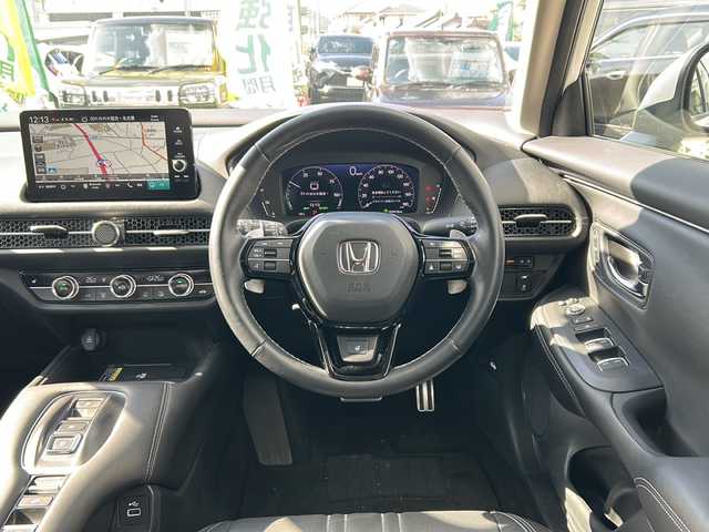 ホンダ ＺＲ－Ｖ ハイブリッド e:HEV Z 愛知県 2023(令5)年 3.6万km プラチナホワイトパール ・禁煙車/・純正９インチナビ/・フルセグTV/・BOSEプレミアムサウンド/・マルチヴューカメラ/・黒本革シート/・ホンダセンシング/・前席パワーシート/・前席シートヒーター/・前後ドライブレコーダー/・ビルトインETC2.0/・ワイヤレス充電/・アダプティブドライビングビーム/・ステアリングヒーター/・ハンズフリーパワーテールゲート/・パドルシフト/・ドライブモードスイッチ/・純正１８インチアルミ/・パーキングセンサー/・電子パーキング/・電動格納ミラーウインカー/・純正フロアマット/・取扱説明書
