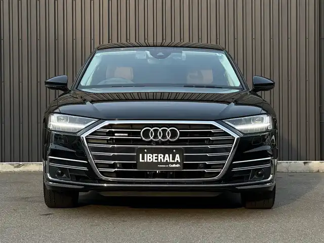 アウディ Ａ８ 55TFSIクワトロ 福島県 2019(令1)年 2.4万km ミトスブラックメタリック アシスタンスパッケージ/・フロントクロストラフィックアシスト/・アダプティブウインドウスクリーンワイパー/・センターエアバッグ/コンフォートパッケージ/・インディビジュアル電動シート（リヤ）/・コンフォートヘッドレスト（リヤ）/・シートヒーター（リヤ）/・ランバーサポート（リヤサイドシート）/・シートベンチレーション　マッサージ機能（フロント）/・4ゾーン デラックスオートマチック/　エアコンディショナー/・トランクスルー機能/・パワークロージングドア/・マトリクスLEDインテリアライト/・リヤシートリモート/・ミュージックインターフェイスリヤ/純正MMIナビ/全方位カメラ/フルセグTV/アダプティブクルーズコントロール/サイドアシスト/バルコナレザーシート（茶）/全席パワーシート/ヘッドアップディスプレイ/Bang & Olufsenサウンドシステム/プライバシーガラス/OP20インチAW/アンビエントライト/サマータイヤのみ積込（265/40/20）/社外レーダー/取扱説明書/保証書