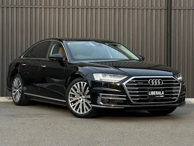 アウディ Ａ８ 55TFSIクワトロ 福島県 2019(令1)年 2.4万km ミトスブラックメタリック アシスタンスパッケージ/・フロントクロストラフィックアシスト/・アダプティブウインドウスクリーンワイパー/・センターエアバッグ/コンフォートパッケージ/・インディビジュアル電動シート（リヤ）/・コンフォートヘッドレスト（リヤ）/・シートヒーター（リヤ）/・ランバーサポート（リヤサイドシート）/・シートベンチレーション　マッサージ機能（フロント）/・4ゾーン デラックスオートマチック/　エアコンディショナー/・トランクスルー機能/・パワークロージングドア/・マトリクスLEDインテリアライト/・リヤシートリモート/・ミュージックインターフェイスリヤ/純正MMIナビ/全方位カメラ/フルセグTV/アダプティブクルーズコントロール/サイドアシスト/バルコナレザーシート（茶）/全席パワーシート/ヘッドアップディスプレイ/Bang & Olufsenサウンドシステム/プライバシーガラス/OP20インチAW/アンビエントライト/サマータイヤのみ積込（265/40/20）/社外レーダー/取扱説明書/保証書