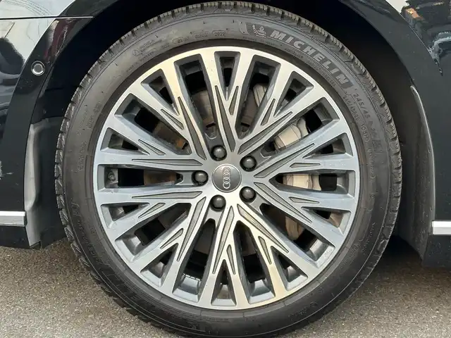 アウディ Ａ８ 55TFSIクワトロ 福島県 2019(令1)年 2.4万km ミトスブラックメタリック アシスタンスパッケージ/・フロントクロストラフィックアシスト/・アダプティブウインドウスクリーンワイパー/・センターエアバッグ/コンフォートパッケージ/・インディビジュアル電動シート（リヤ）/・コンフォートヘッドレスト（リヤ）/・シートヒーター（リヤ）/・ランバーサポート（リヤサイドシート）/・シートベンチレーション　マッサージ機能（フロント）/・4ゾーン デラックスオートマチック/　エアコンディショナー/・トランクスルー機能/・パワークロージングドア/・マトリクスLEDインテリアライト/・リヤシートリモート/・ミュージックインターフェイスリヤ/純正MMIナビ/全方位カメラ/フルセグTV/アダプティブクルーズコントロール/サイドアシスト/バルコナレザーシート（茶）/全席パワーシート/ヘッドアップディスプレイ/Bang & Olufsenサウンドシステム/プライバシーガラス/OP20インチAW/アンビエントライト/サマータイヤのみ積込（265/40/20）/社外レーダー/取扱説明書/保証書