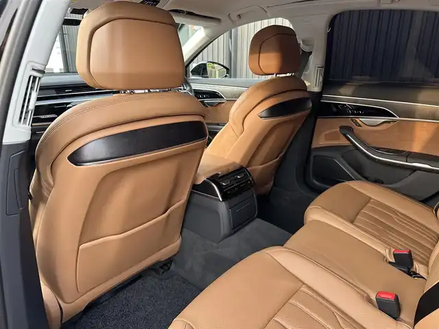 アウディ Ａ８ 55TFSIクワトロ 福島県 2019(令1)年 2.4万km ミトスブラックメタリック アシスタンスパッケージ/・フロントクロストラフィックアシスト/・アダプティブウインドウスクリーンワイパー/・センターエアバッグ/コンフォートパッケージ/・インディビジュアル電動シート（リヤ）/・コンフォートヘッドレスト（リヤ）/・シートヒーター（リヤ）/・ランバーサポート（リヤサイドシート）/・シートベンチレーション　マッサージ機能（フロント）/・4ゾーン デラックスオートマチック/　エアコンディショナー/・トランクスルー機能/・パワークロージングドア/・マトリクスLEDインテリアライト/・リヤシートリモート/・ミュージックインターフェイスリヤ/純正MMIナビ/全方位カメラ/フルセグTV/アダプティブクルーズコントロール/サイドアシスト/バルコナレザーシート（茶）/全席パワーシート/ヘッドアップディスプレイ/Bang & Olufsenサウンドシステム/プライバシーガラス/OP20インチAW/アンビエントライト/サマータイヤのみ積込（265/40/20）/社外レーダー/取扱説明書/保証書