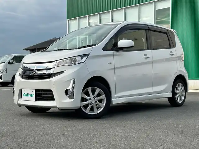 三菱 ｅＫカスタム M 静岡県 2014(平26)年 3.1万km シルキーホワイト 社外オーディオCD/パワーステアリング/パワーウィンドウ/アイドリングストップ/スペアキー１本/オートエアコン/ドアバイザー/AUX接続/純正フロアマット/純正アルミホイール/キセノンヘッドライト/ABS/Wエアバック