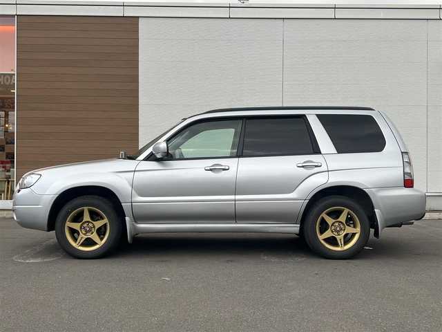 スバル フォレスター X 秋田県 2005(平17)年 13.4万km プレミアムシルバーメタリック オーディオ（AM/FM/CD)/４WD/リモコンキー/社外アルミ/アイドリングストップ/MTモード付AT/ルーフレール/純正フロアマット/純正ドアバイザー/オートエアコン/パワーステアリング/パワーウィンドウ/電動格納ウィンカーミラー/保証書/取扱説明書/記録簿
