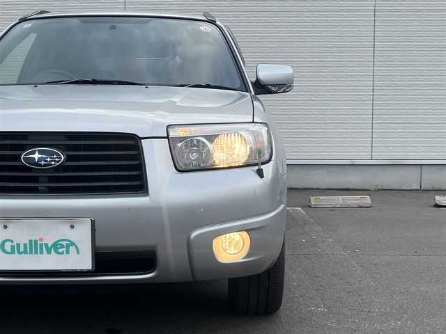 スバル フォレスター X 秋田県 2005(平17)年 13.4万km プレミアムシルバーメタリック オーディオ（AM/FM/CD)/４WD/リモコンキー/社外アルミ/アイドリングストップ/MTモード付AT/ルーフレール/純正フロアマット/純正ドアバイザー/オートエアコン/パワーステアリング/パワーウィンドウ/電動格納ウィンカーミラー/保証書/取扱説明書/記録簿