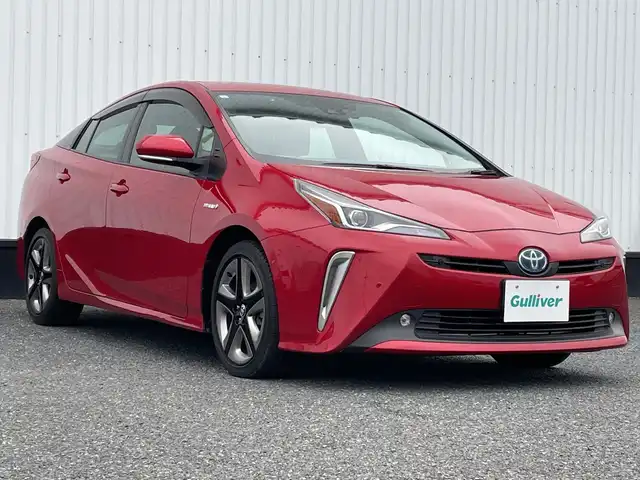 トヨタ プリウス A プレミアム　ツーリングセレ 千葉県 2019(令1)年 1.4万km エモーショナルレッドⅡ 純正9インチナビ/(フルセグTV/BT/CD/DVD/FM/AM)/バックカメラ/ブラインドスポットモニター/パーキングアシスト/ヘッドアップディスプレイ/ドライブレコーダー/衝突被害軽減システム/車線逸脱警報/レーダークルーズコントロール/レザーシート/横滑り防止装置/ビルトインETC2.0/アイドリングストップ/LEDヘッドライト/フォグランプ/オートライト/ウィンカーミラー/電動格納ミラー/純正17インチAW/シートヒーター/エアシート/シートリフター/プッシュスタート/スマートキー/フロアマット/ドアバイザー