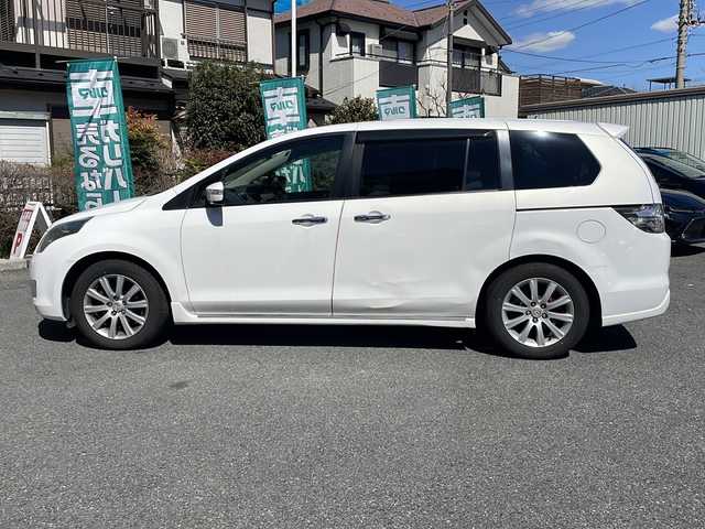 マツダ ＭＰＶ 23C Sporty Pack 埼玉県 2006(平18)年 17万km クリスタルホワイトパールマイカ 純正ナビ/・AM/FM/CD/DVD/ETC/BOSE/社外デジタルインナーミラー/両側パワースライドドア/後席用フリップダウンモニター/オットマン/HIDヘッドライト/フォグランプ/ドアバイザー/保証書