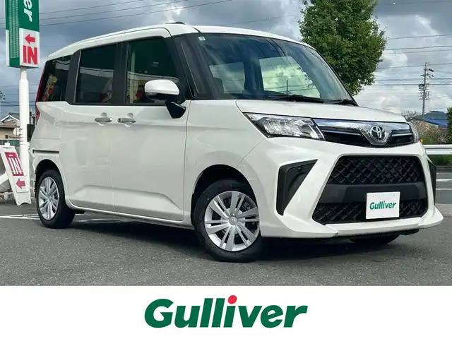 トヨタ ルーミー G 愛知県 2025(令7)年 0.1万km パールホワイトⅢ ワンオーナー/フルセグテレビ/バックカメラ/アラウンドビュー/Bluetooth/アイドリングストップ/ウィンカーミラー/プッシュスタート/両側パワースライドドア/レーンキープ/衝突軽減ブレーキ/前後ドラレコ