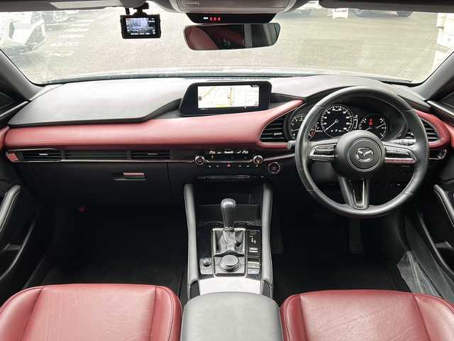 マツダ マツダ３ファストバック 20S バーガンディセレクション 岩手県 2020(令2)年 5.6万km セラミックM 4WD/ワンオーナー /純正ナビ /DVD再生/フルセグTV/赤革シート /ETC /バックカメラ /運転席パワーシート /前席シートヒーター /ステアリングヒーター /ステアリングスイッチ/社外前後ドラレコ /革巻きステアリング/レーダークルコン/オートライト/オートハイビーム/パドルシフト/ドアバイザー/フロアマット/リアワイパー/衝突軽減装置/保証書