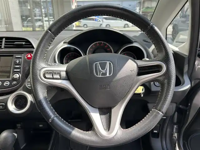 ホンダ フィット RS 大阪府 2007(平19)年 12.7万km ストームシルバーメタリック 純正HDDナビ/バックカメラ/パドルシフト/ETC/取扱説明書