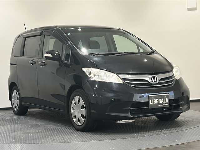 ホンダ フリード G ジャストセレクション 新潟県 2012(平24)年 10.5万km プレミアムブラキッシュパール 社外SDナビ（TV/DVD/BT）/バックカメラ/クルーズコントロール/両側パワースライドドア/純正フロアマット/ドアバイザー/リモコンキー/ドライブレコーダー/ETC
