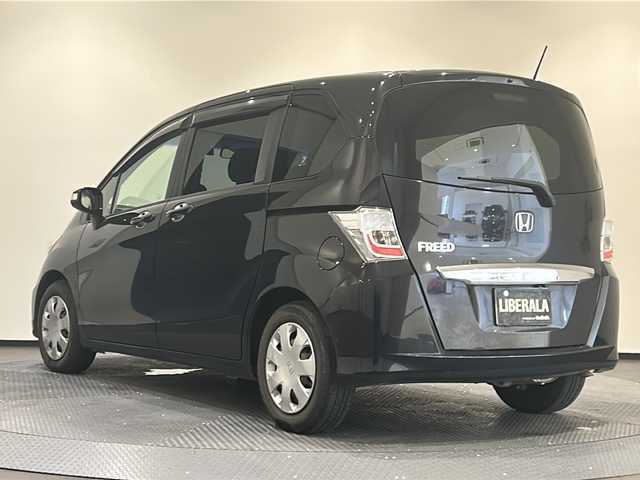 ホンダ フリード G ジャストセレクション 新潟県 2012(平24)年 10.5万km プレミアムブラキッシュパール 社外SDナビ（TV/DVD/BT）/バックカメラ/クルーズコントロール/両側パワースライドドア/純正フロアマット/ドアバイザー/リモコンキー/ドライブレコーダー/ETC