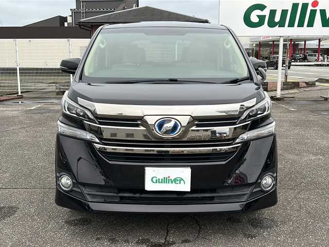 トヨタ ヴェルファイア ハイブリット X 富山県 2015(平27)年 16.2万km バーニングブラッククリスタルシャインガラスフレーク スマートキー/4WD/両側パワースライドドア/メーカーオプションナビ/3列シート/フルセグTV/DVD再生/Bluetooth/ビルトインETC/バックカメラ/純正16インチAW/クルーズコントロール/LEDヘッドライト/フォグランプ/純正フロアマット/純正ドアバイザー/横滑り防止装置/電動格納ウィンカーミラー/キャプテンシート/オートライト/クリアランスソナー/オットマン