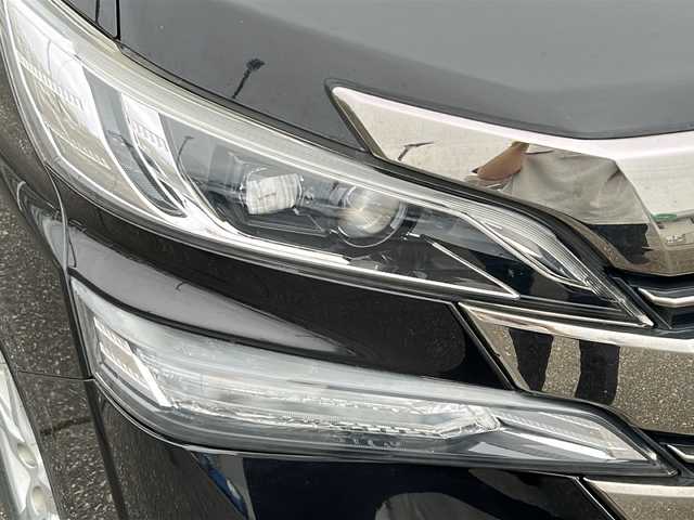 トヨタ ヴェルファイア ハイブリット X 富山県 2015(平27)年 16.2万km バーニングブラッククリスタルシャインガラスフレーク スマートキー/4WD/両側パワースライドドア/メーカーオプションナビ/3列シート/フルセグTV/DVD再生/Bluetooth/ビルトインETC/バックカメラ/純正16インチAW/クルーズコントロール/LEDヘッドライト/フォグランプ/純正フロアマット/純正ドアバイザー/横滑り防止装置/電動格納ウィンカーミラー/キャプテンシート/オートライト/クリアランスソナー/オットマン