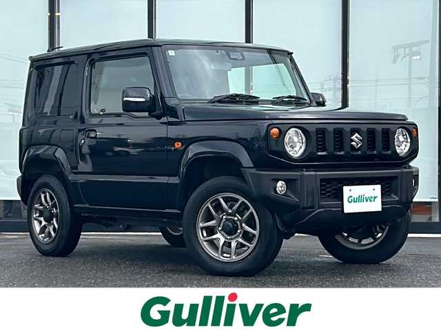 スズキ ジムニー XC 山形県 2024(令6)年 1.7万km ブルーイッシュブラックパール3 禁煙車/４WD/デュアルセンサーブレーキ/レーンキープアシスト/横滑り防止装置/クルーズコントロール/社外SDナビ/（Bluetooth/フルセグ/DVD/AM/FM)/ステアリングスイッチ/アイドリングストップ/前席シートヒーター/ETC/社外フロアマット/オートLEDヘッドライト/フォグランプ/背面タイヤ/社外スタッドレスタイヤ車載/（175/80/R16)5mm 4本